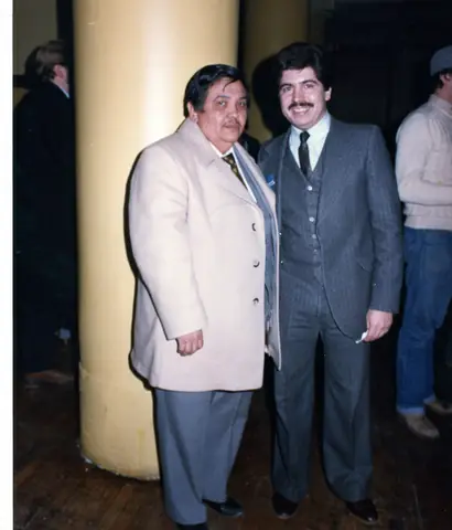 Rudy Lozano with fellow organizers